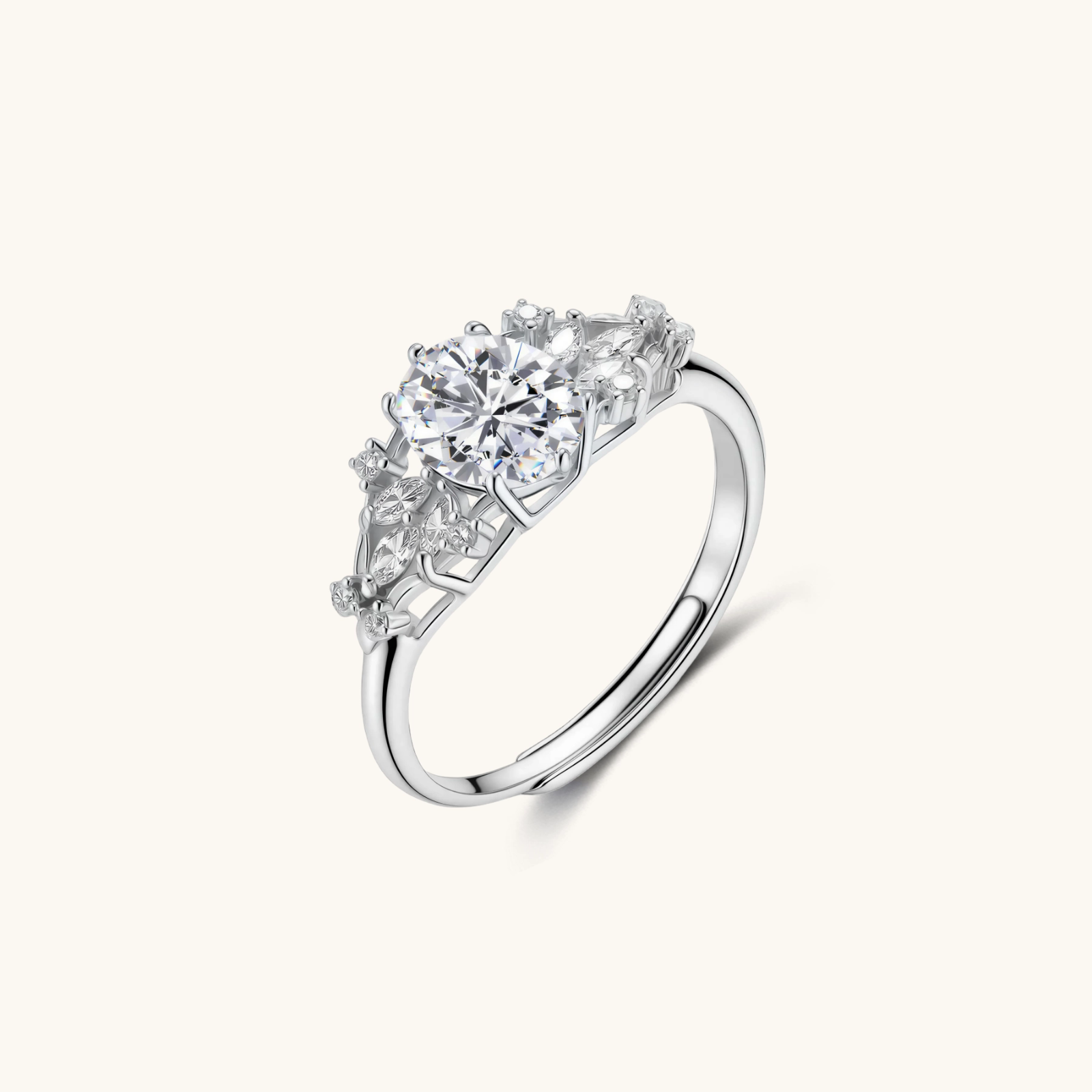 242027068243005440.webp Sterling silver ring with oval moissanite center stone surrounded by smaller accent stones in ornate setting